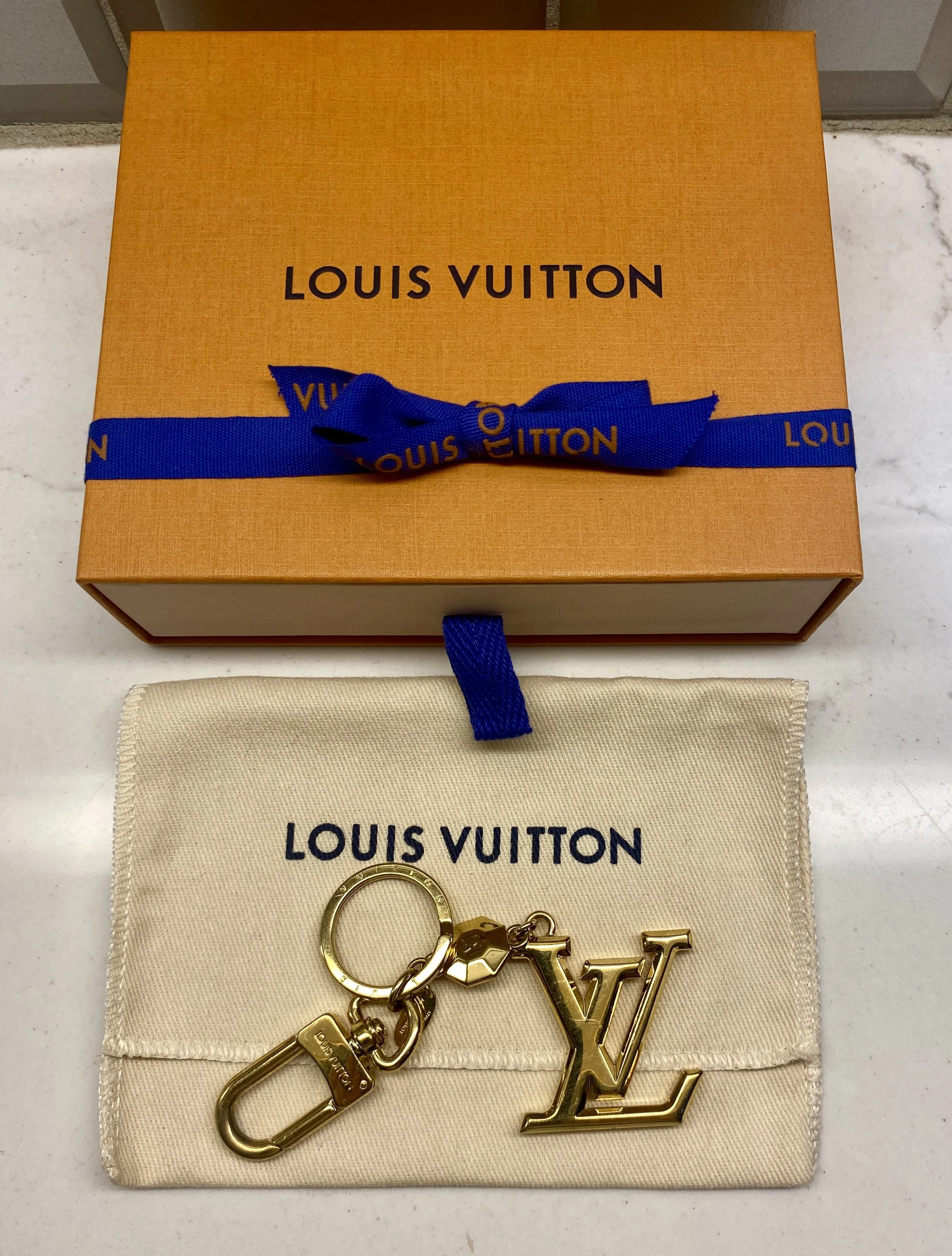 LV Facettes Bag Charm & Key Holder