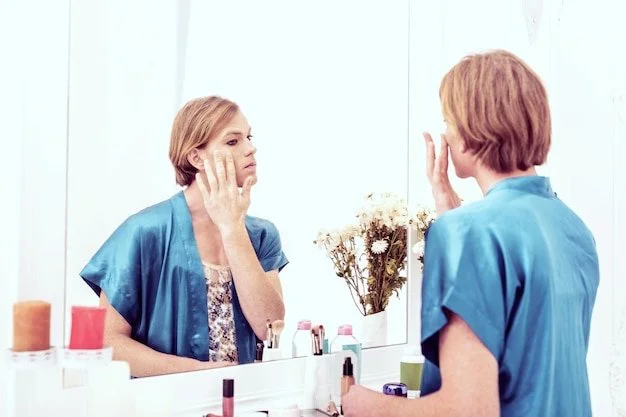 fingers-with-foundation-appealing-queer-person-blue-silk-female-robe-staying-against-mirror-getting-his-face-ready-date_259150-37060.jpg