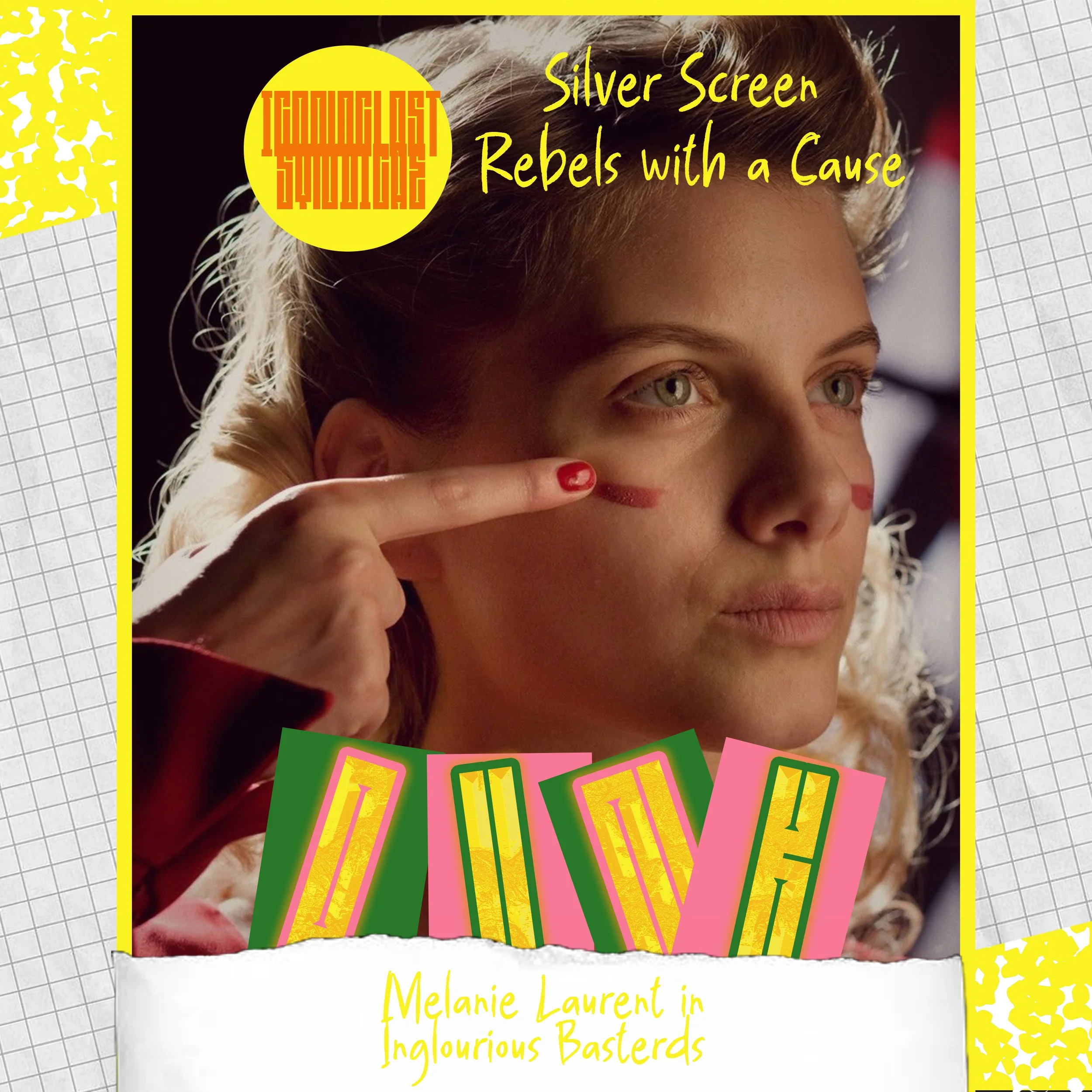 Mélanie Laurent, as Shoshana, points her index finger at her painted red cheek. She wears red lipstick and a red mark painted on her face, her expression serious, her mouth slightly pouting.