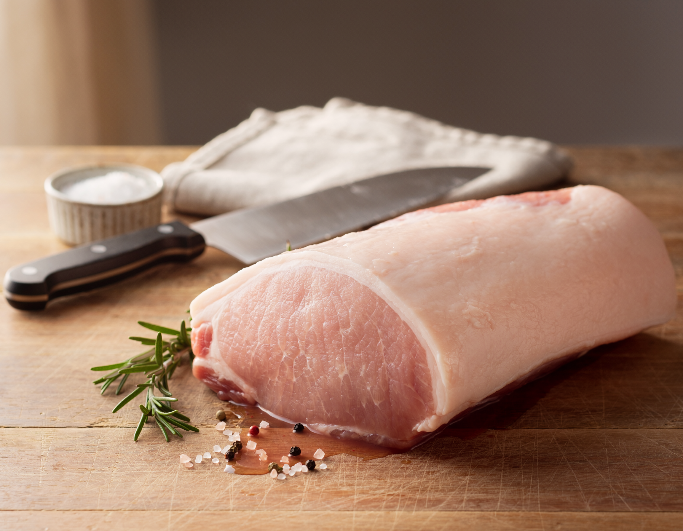 Firefly_fresh butchered pork loin on a table 147004.png