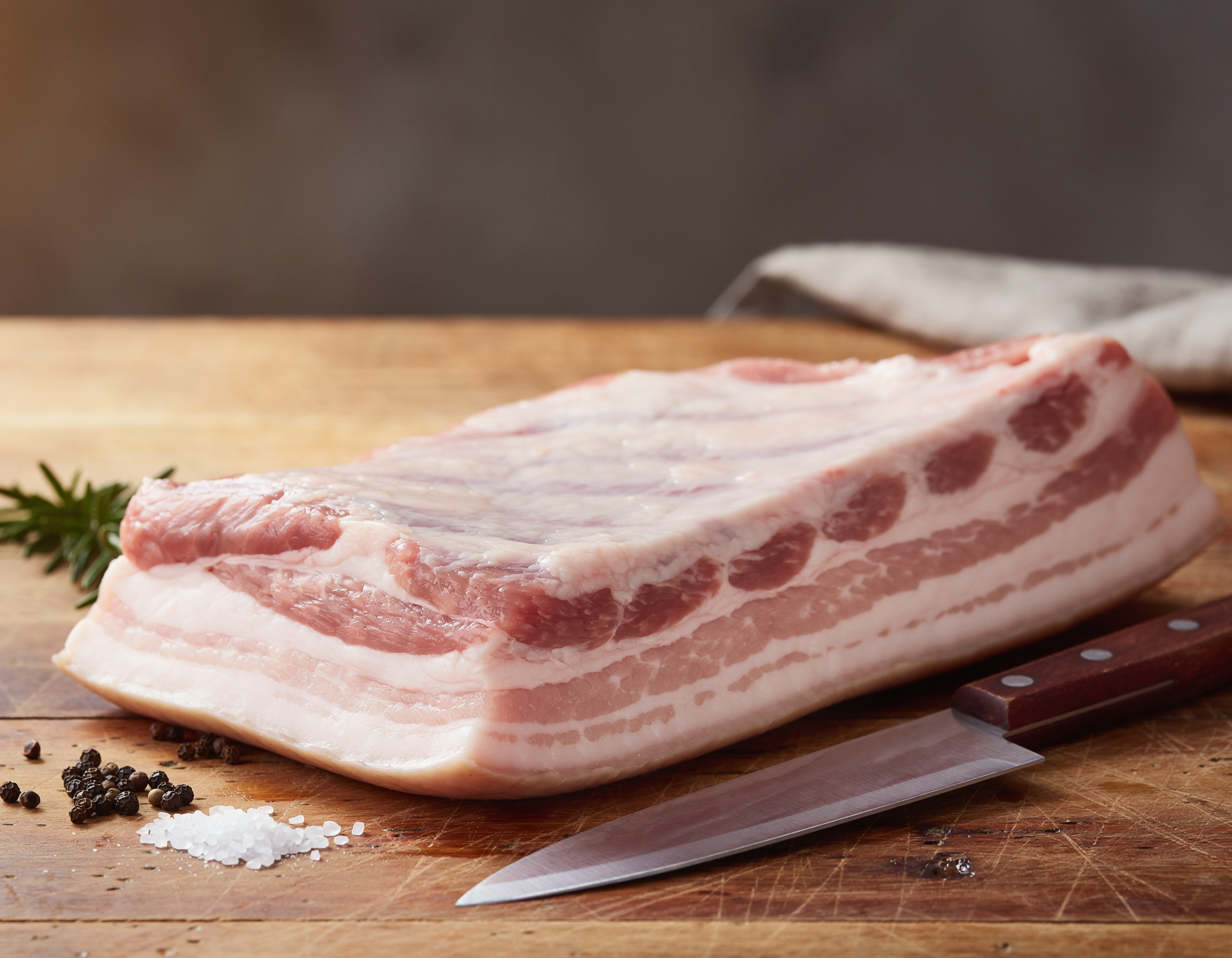 Firefly_fresh butchered pork belly on a table 147004.png