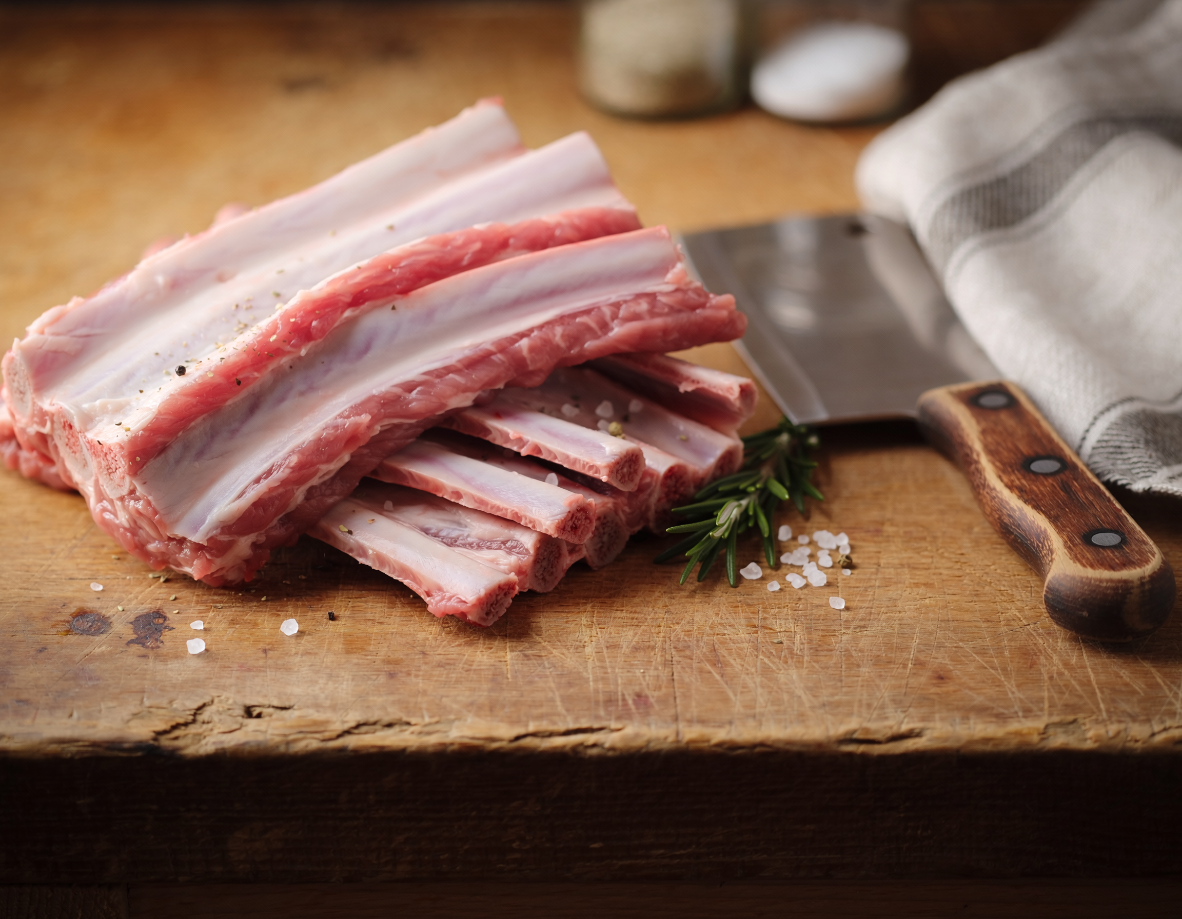 Firefly_fresh butchered lamb riblets on a table 147004.png