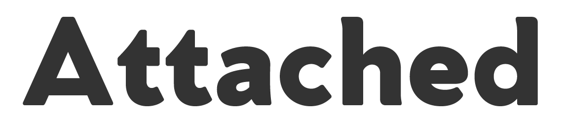 The word 'Attached' in large black font on a white background.