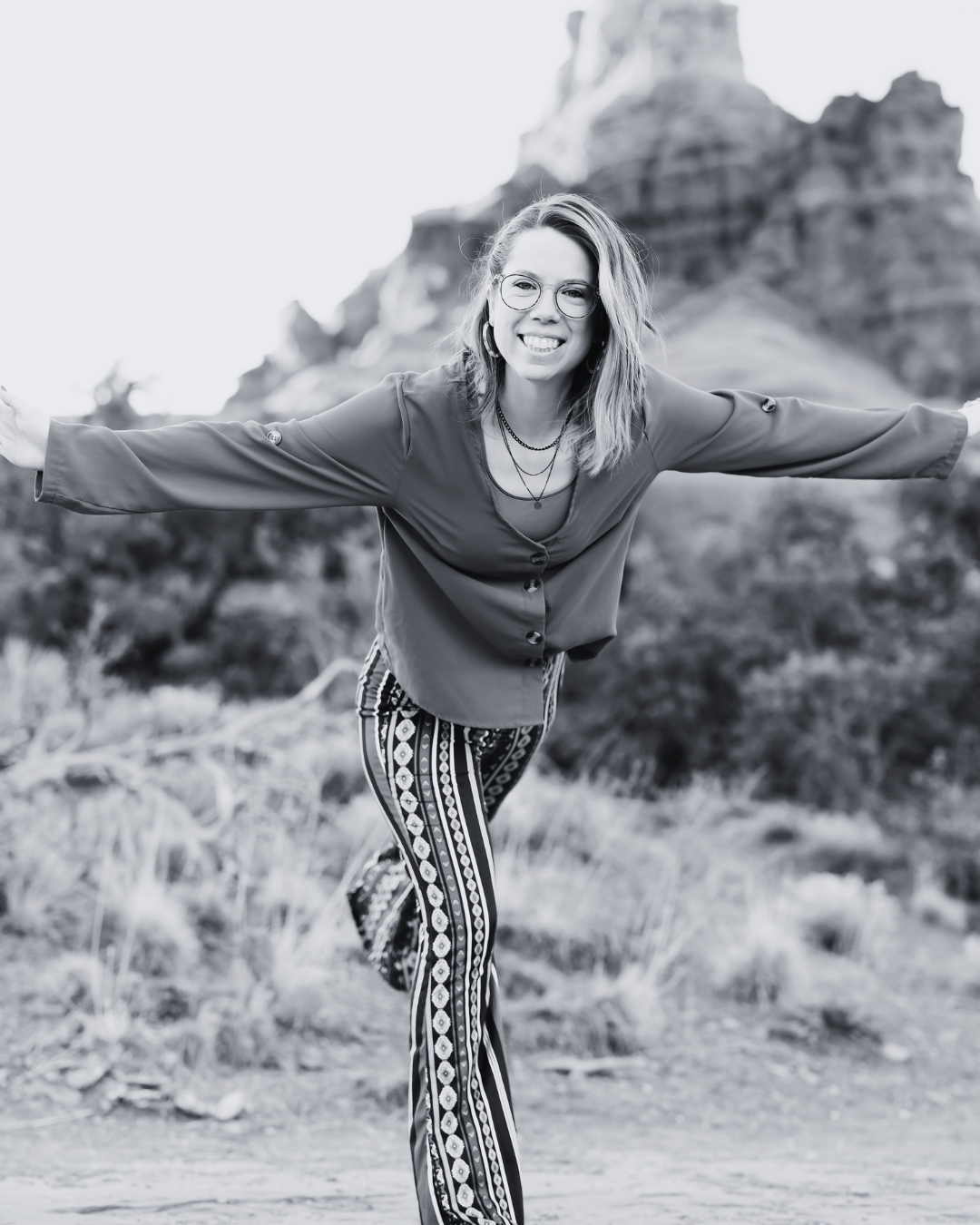 Jessica Wonders, certified integrative women's health coach and founder of Embodied Unbecoming, photographed outdoors by Block Portrait Studios