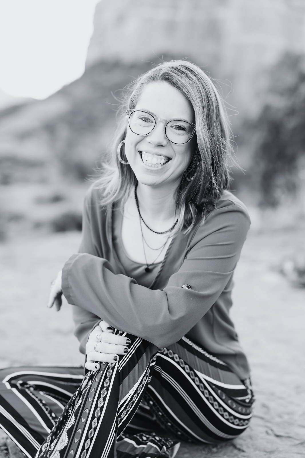 Jessica Wonders, certified integrative women's health coach and founder of Embodied Unbecoming, photographed outdoors by Block Portrait Studios