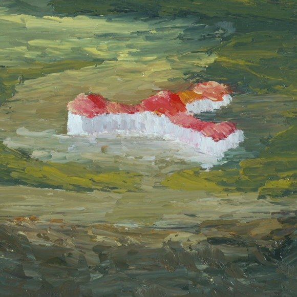 Close-up of the red-roofed Mount Washington Hotel in sunlight in Bretton Woods from the Summit