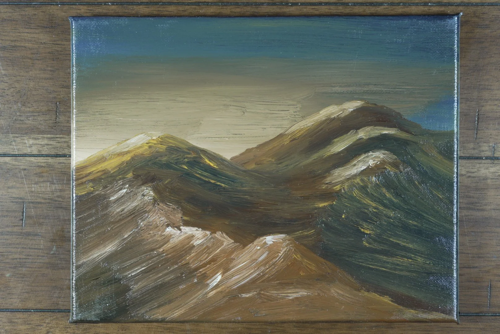Unframed 10x8 gallery-wrapped canvas of the windswept Presidential Range, shown on a wood floor