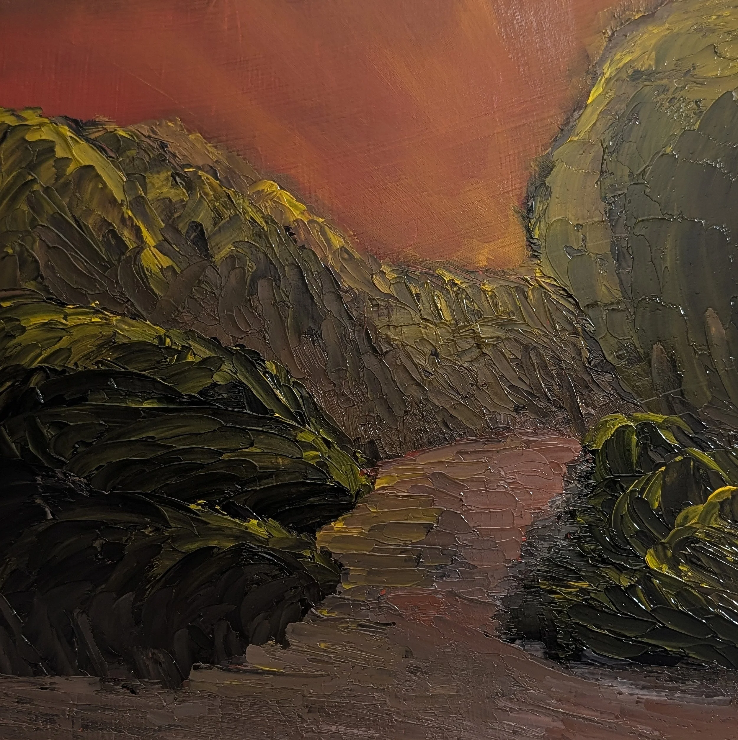 Oil painting of a mountain landscape with a canyon, green hills on both sides, and a river flowing through the valley under a reddish sky.