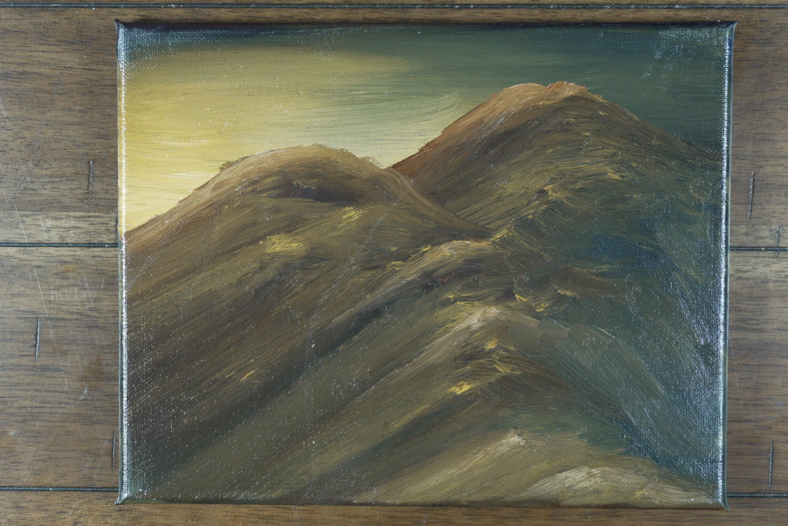 Unframed 10x8 gallery-wrapped canvas of the Presidential Range at dusk, shown on a wood floor