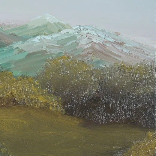 Close-up of palette knife strokes on snow-dusted mountain peaks in teal, mauve and white above golden trees