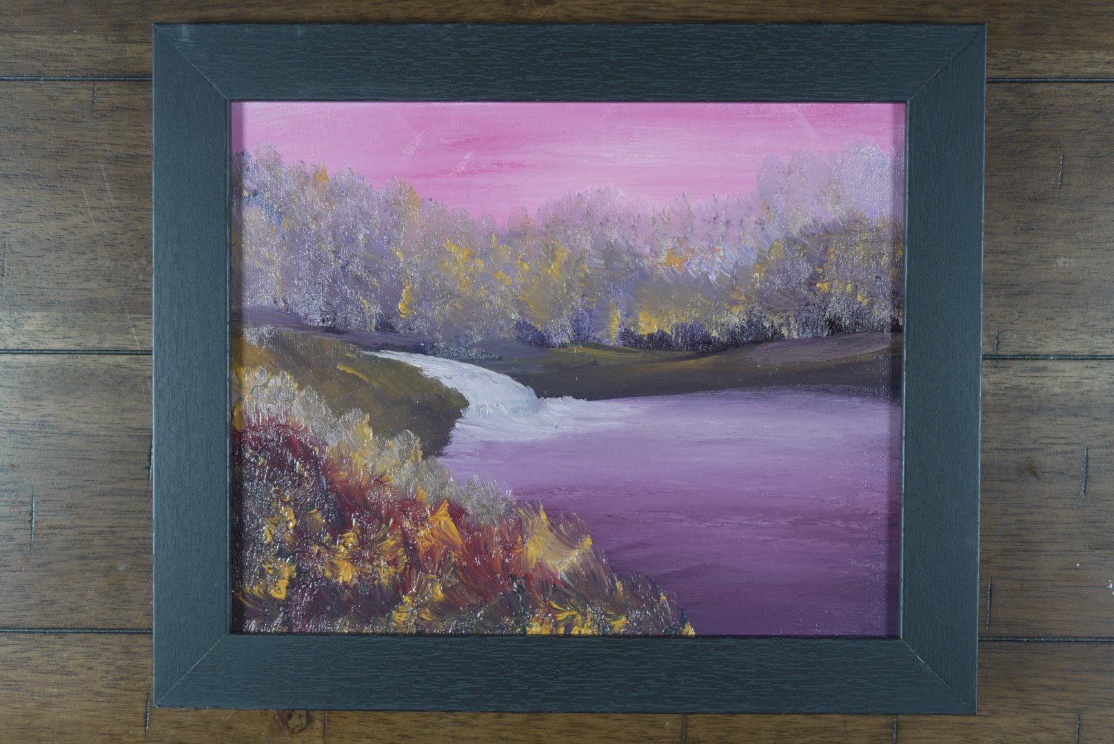 Close-up of textured lavender trees and white falls in Rose Sky Over the Falls