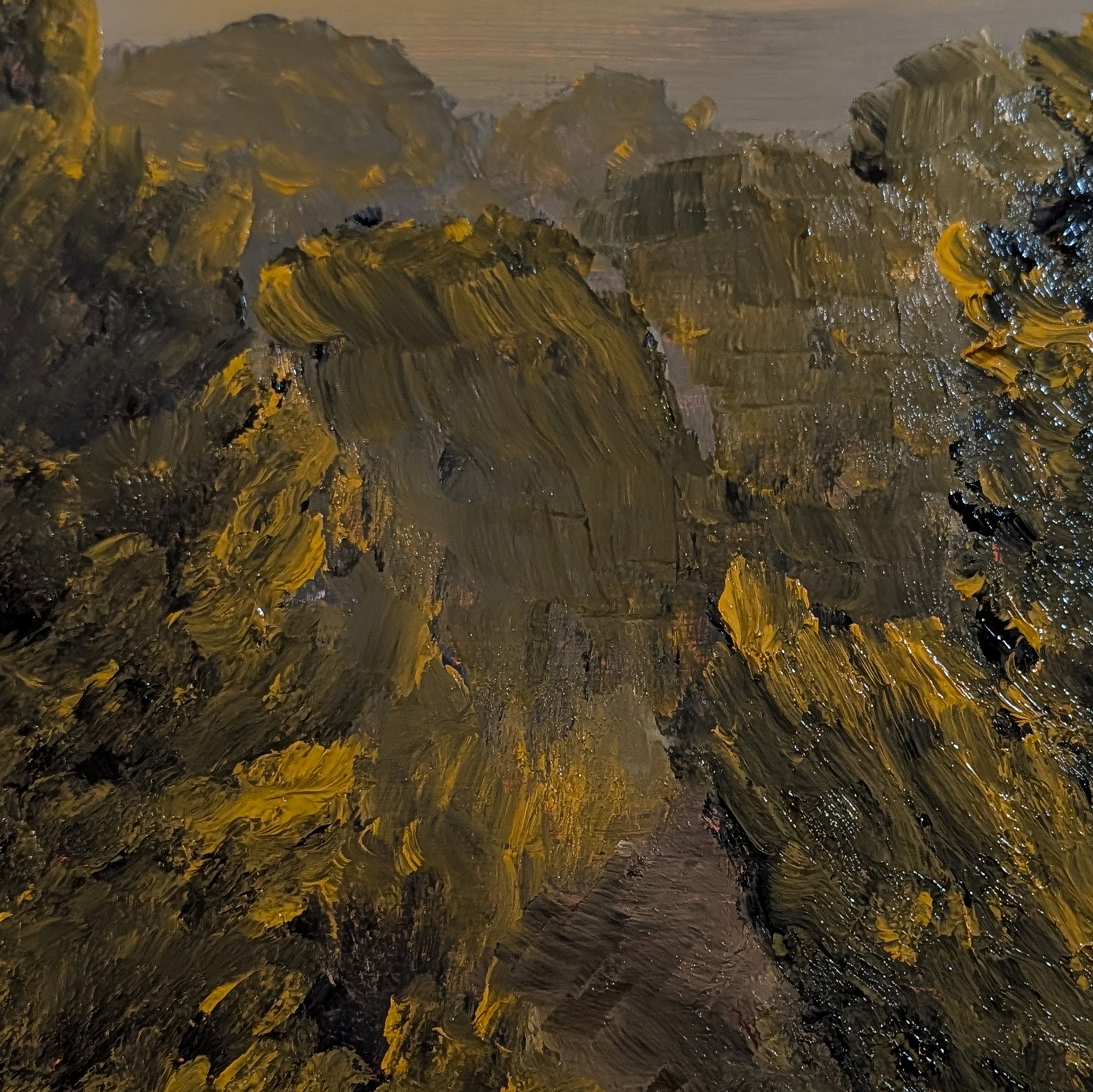 Close-up of an abstract oil painting with thick brushstrokes in shades of brown, yellow, and black.