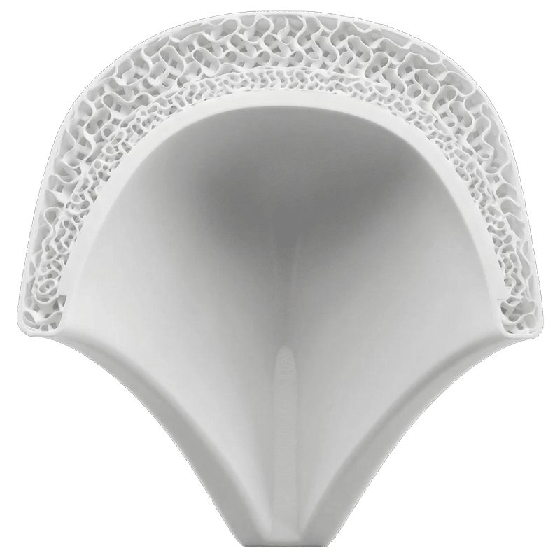 Cross-section of a dental composite resin used for filling cavities in teeth, showing a porous, sponge-like interior structure.