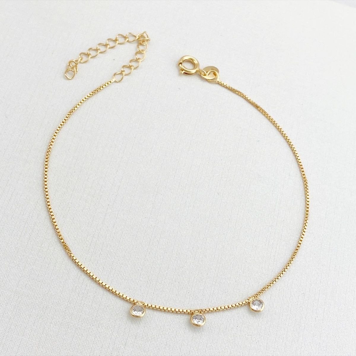 Tornozeleira Dourada com Pontos de Luz