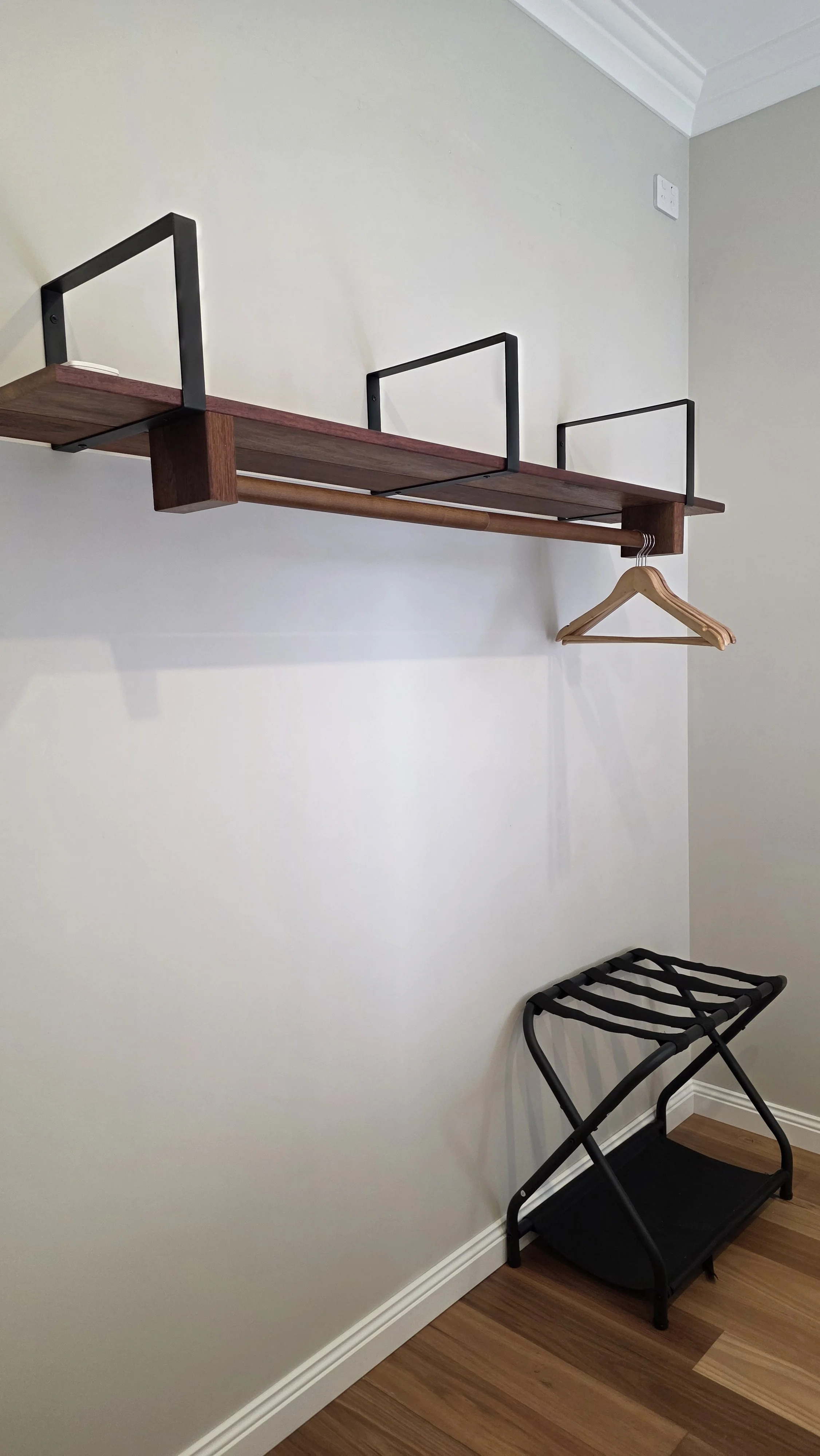Master bedroom - clothes rack and luggage stool