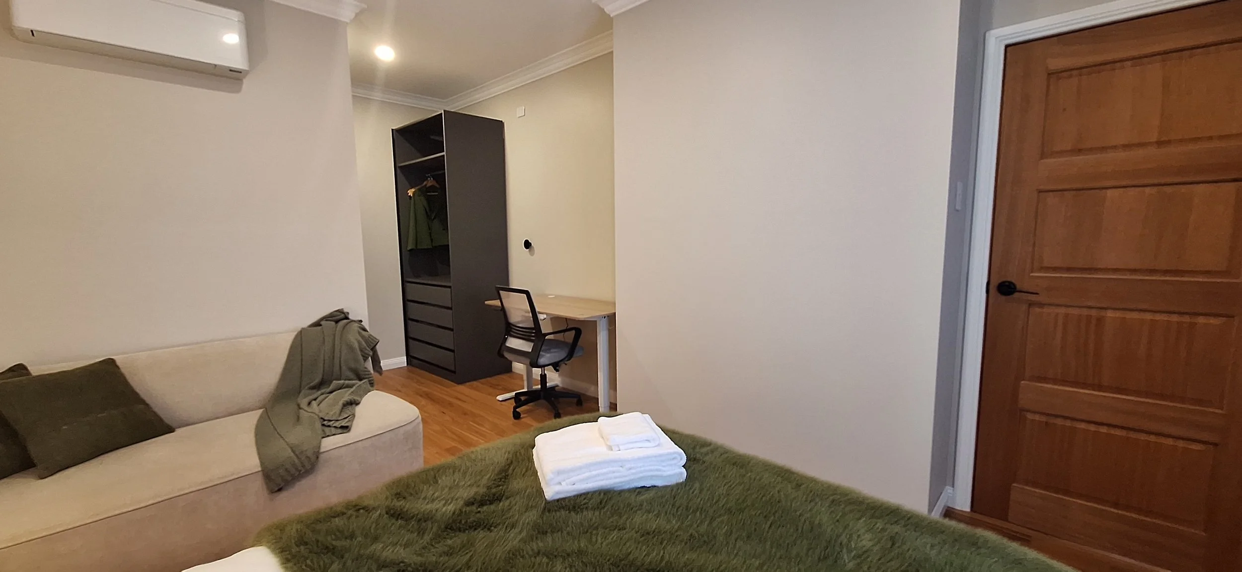Master bedroom - lounge, wardrobe, height-adjustable table and chair
