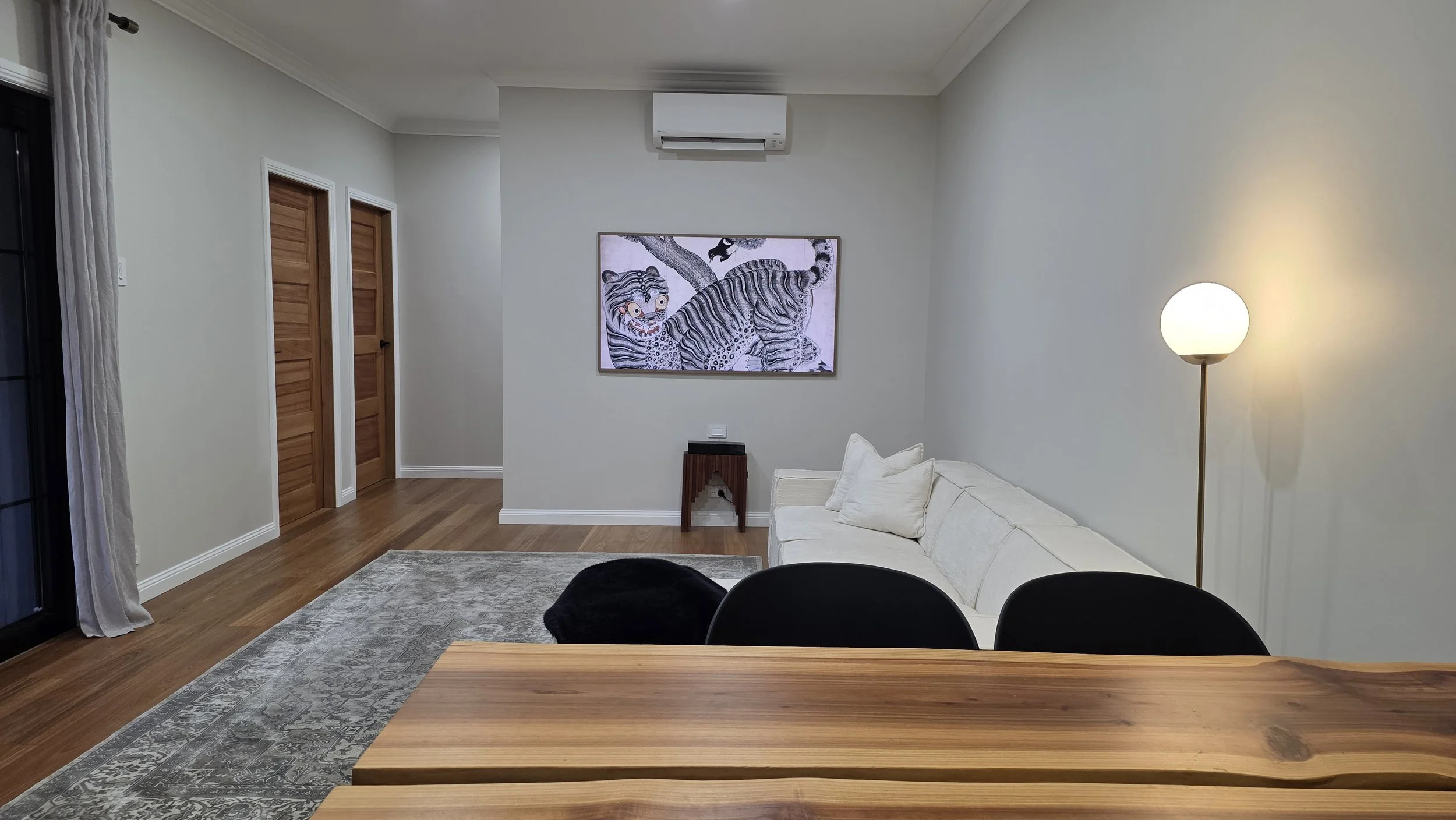 The living room features a Samsung Frame Smart TV for your entertainment and relaxation.
