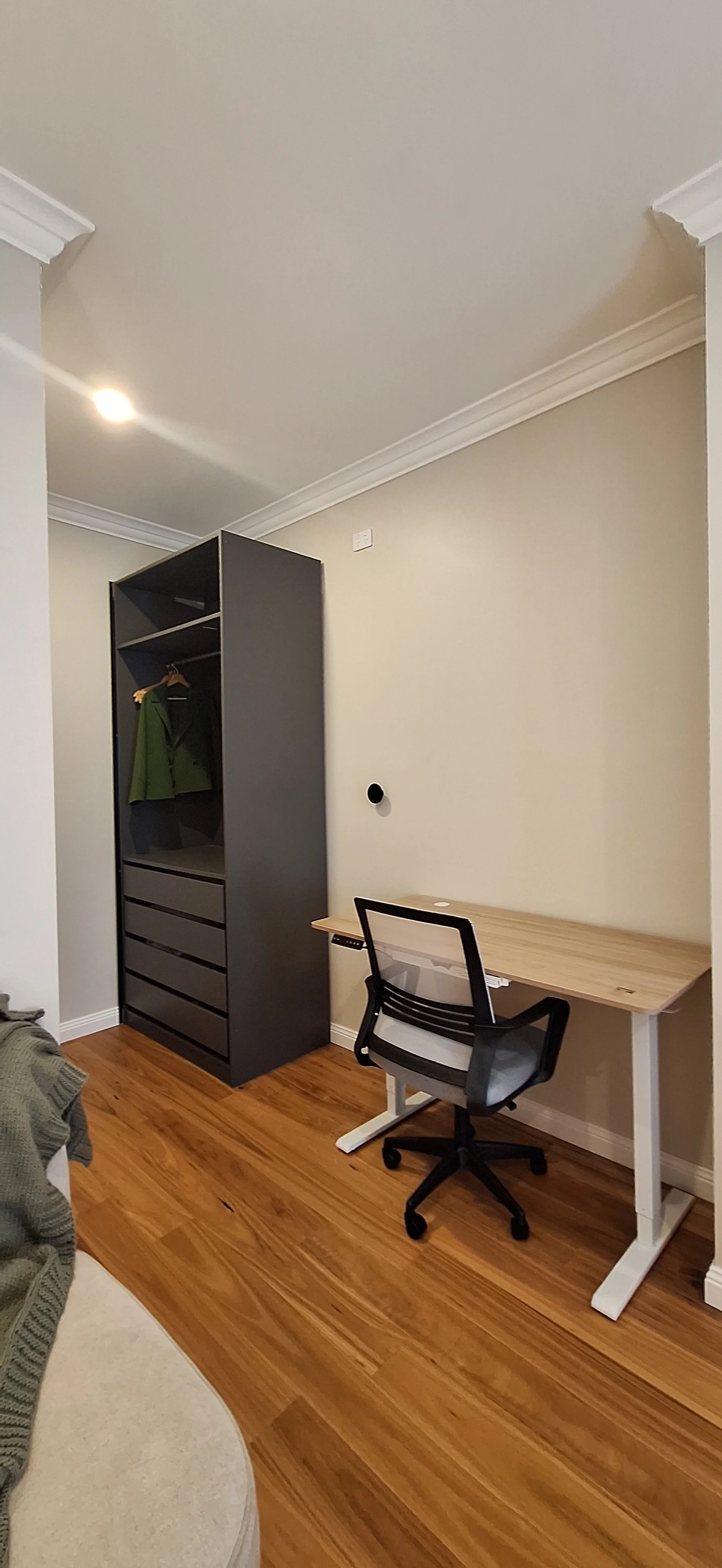 Master bedroom - wardrobe and height adjustable table and chair