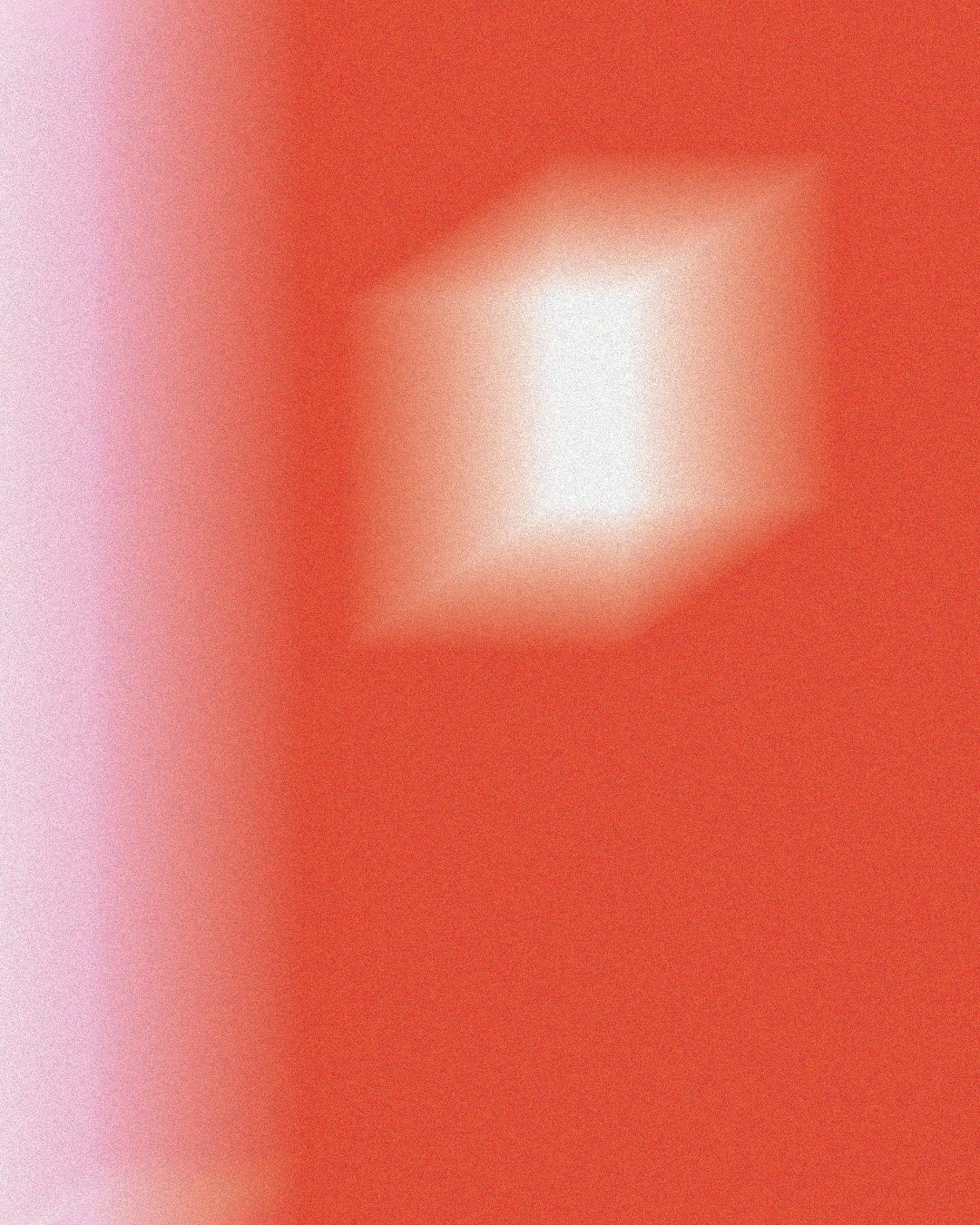 An abstract, blurred image with a red background and a central white or light-colored shape.