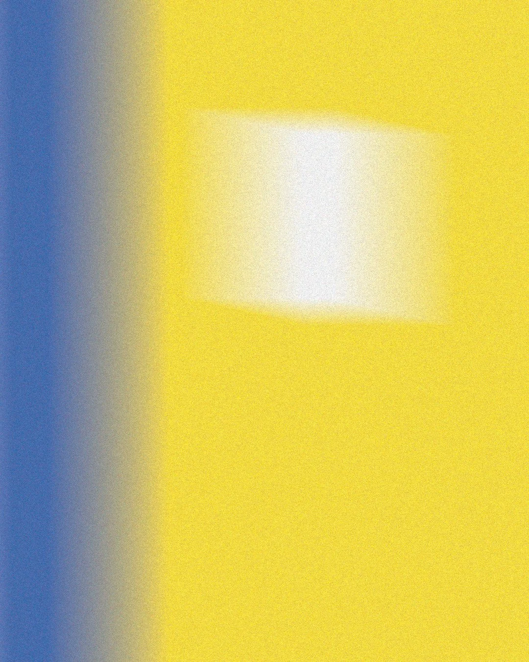 Close-up of a yellow computer keyboard with white keys.
