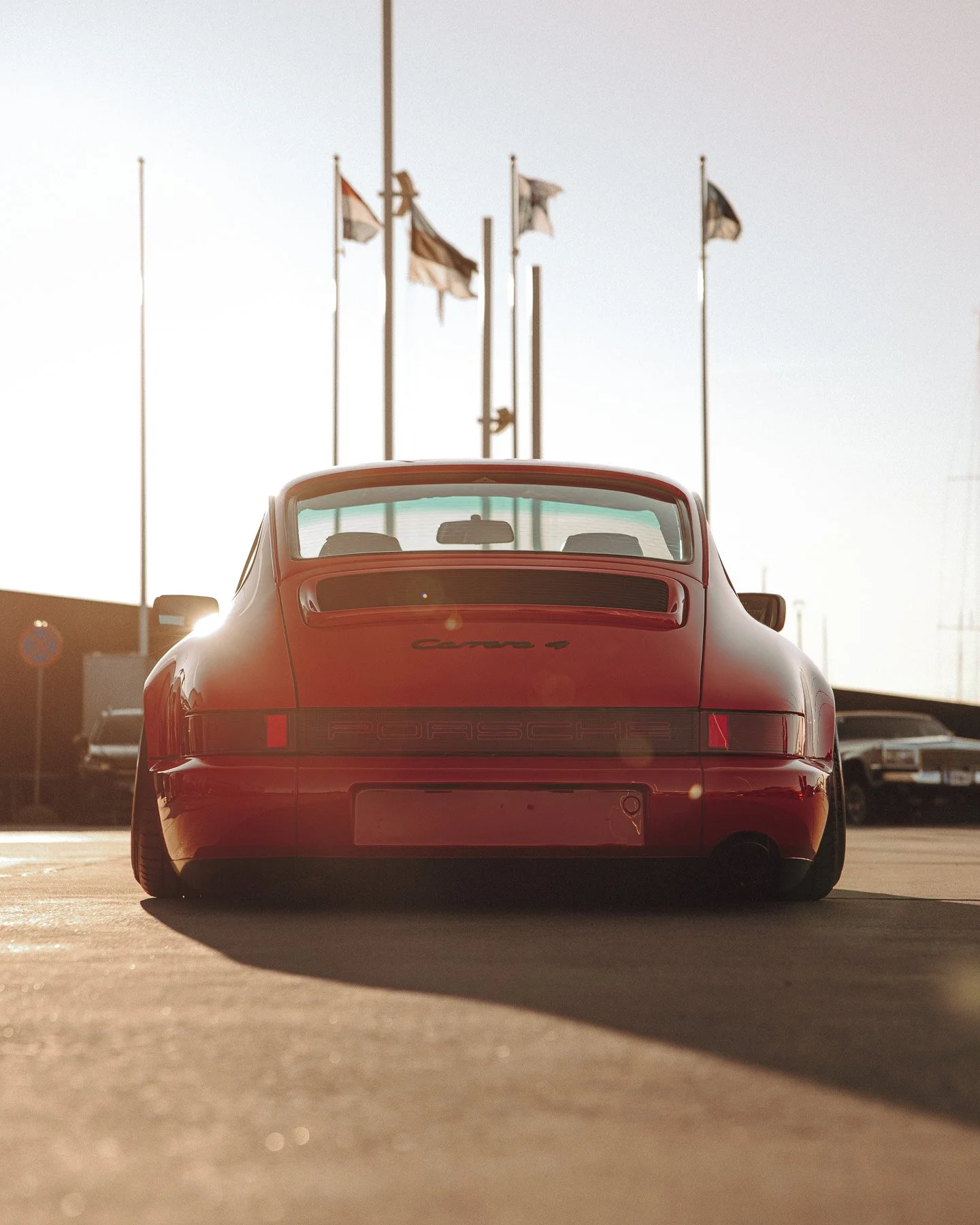 porsche-964-carrera4-rear-sunset-car-show-low-stance.jpg