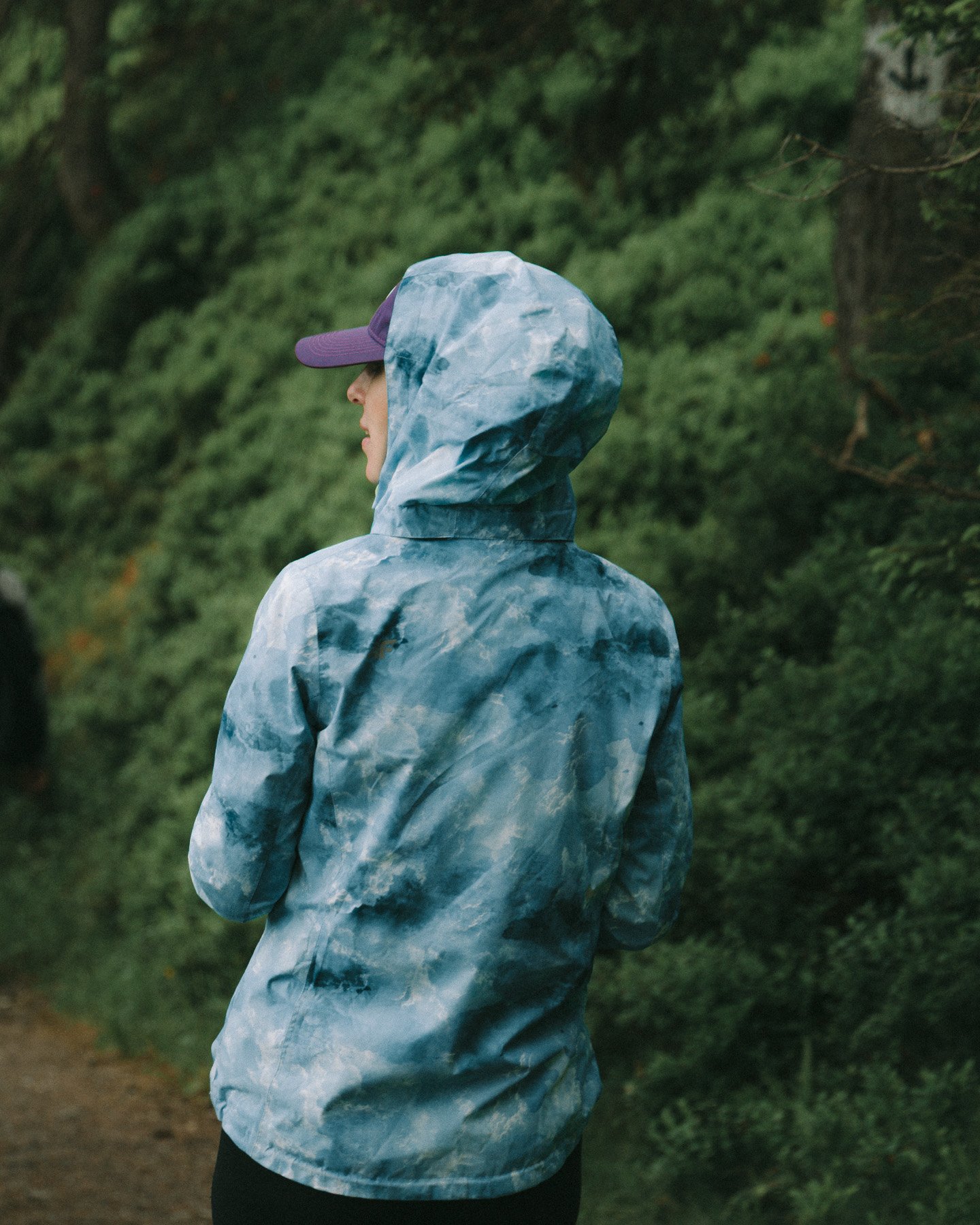 forest-hiking-apparel-back-view-blue-jacket.jpg