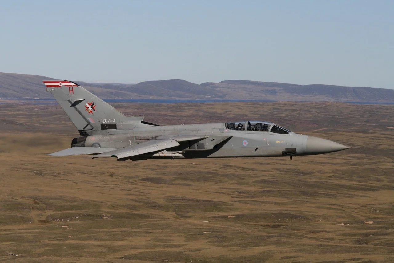 RAF Tornado flies low-level over barren terrain