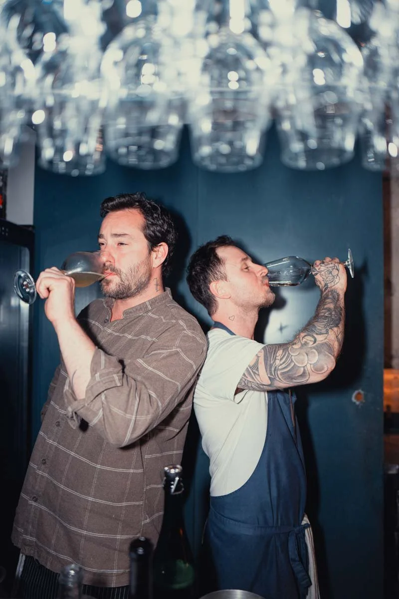 Owner Clément Van Den Bergh and chef Rafael Amsler sharing a drink at VDB Bistronomie, Lisbon