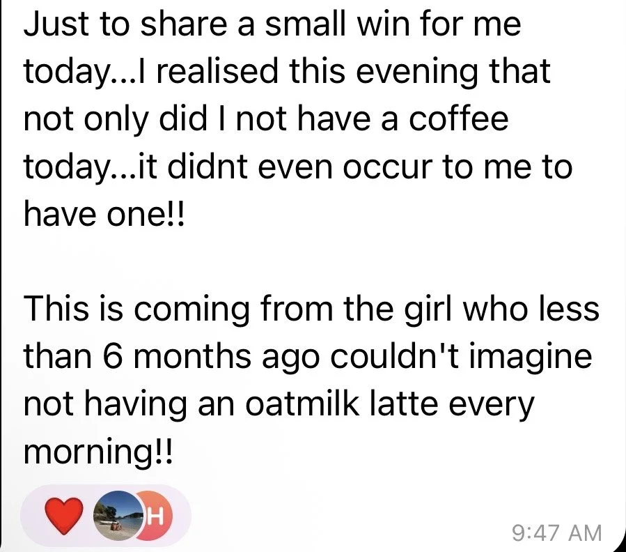 A text-based social media post sharing a small personal achievement and gratitude for drinking oatmilk latte every morning, accompanied by three reaction icons: a red heart, a small landscape photo, and a red heart emoji.
