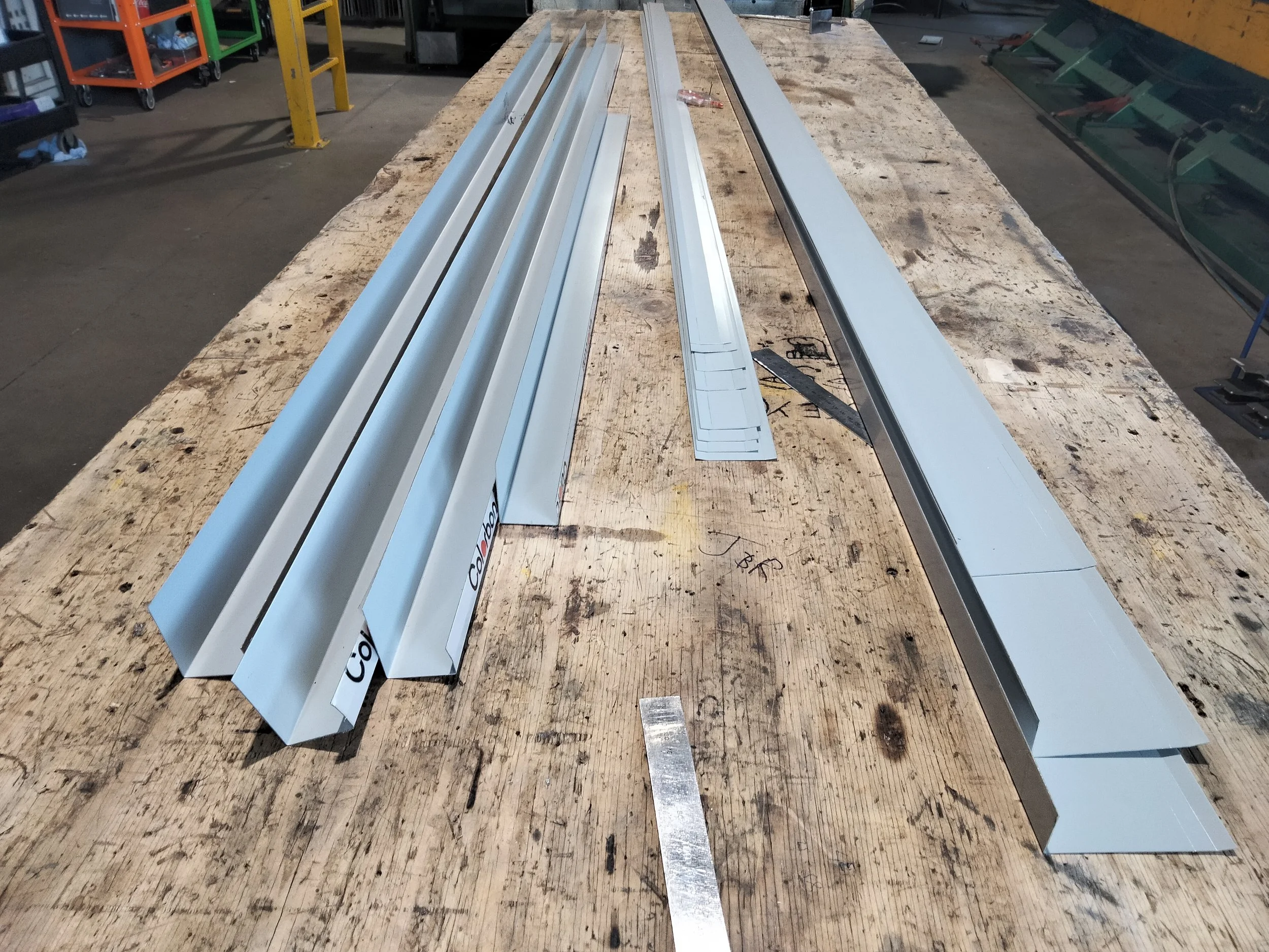 Custom roof flashings and folded sheet metal products manufactured by Eclipse Fabrication in Atherton QLD