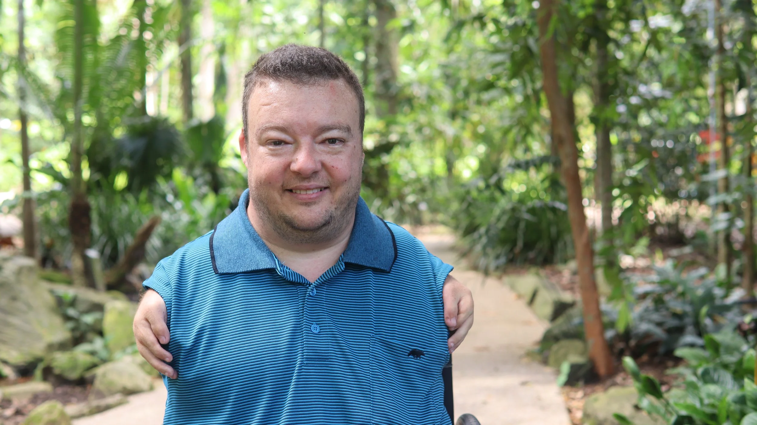 Allan Bunyan, qualified counsellor at Strong Foundation Support in Cairns, smiling outdoors.