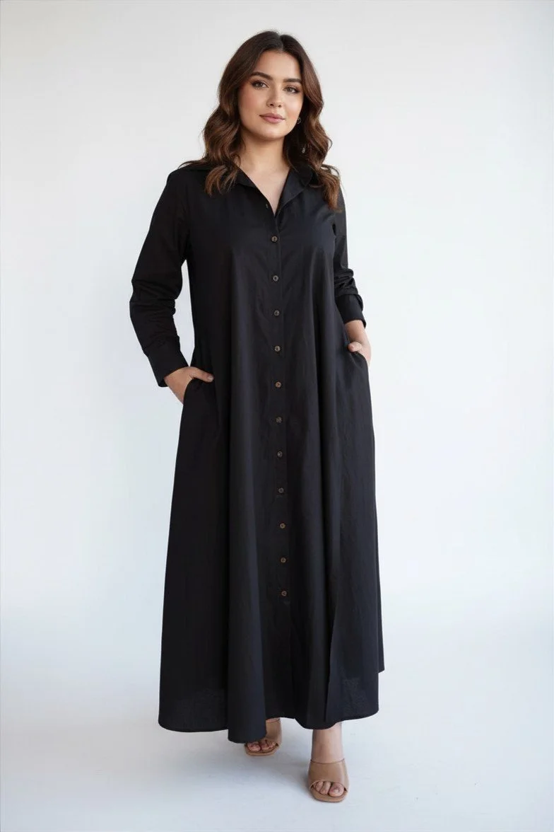 This black solid maxi shirt dress is a timeless wardrobe essential. Designed with a collared neckline and front button-down closure, it gives a smart, polished look while staying super comfortable. The full sleeves and flowy A-line/flare silhouette m