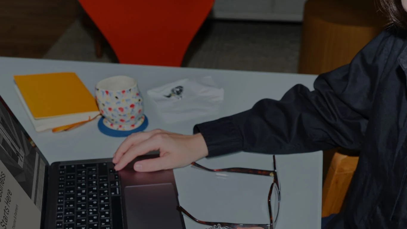 Jayne cook - Fractional CMO working at her computer