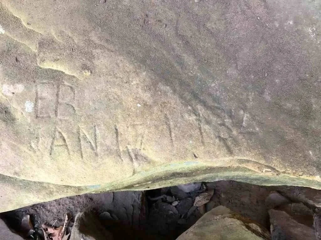 Old rock carving in Mammoth Cave National Park, Kentucky.