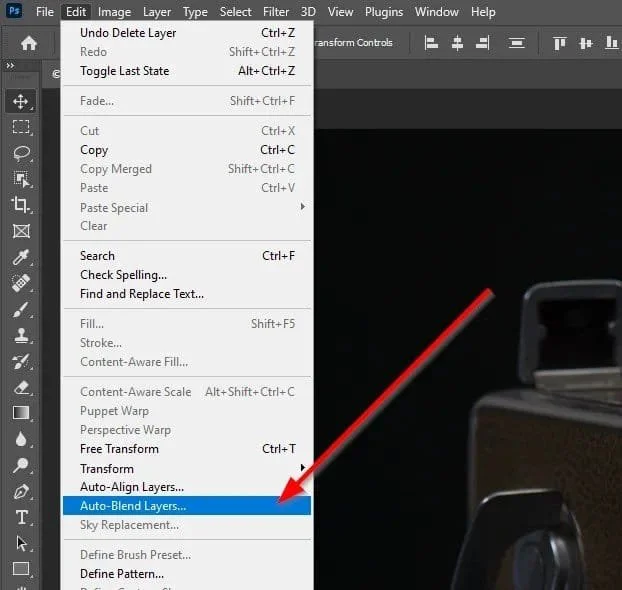 Auto blend layers in Photoshop.