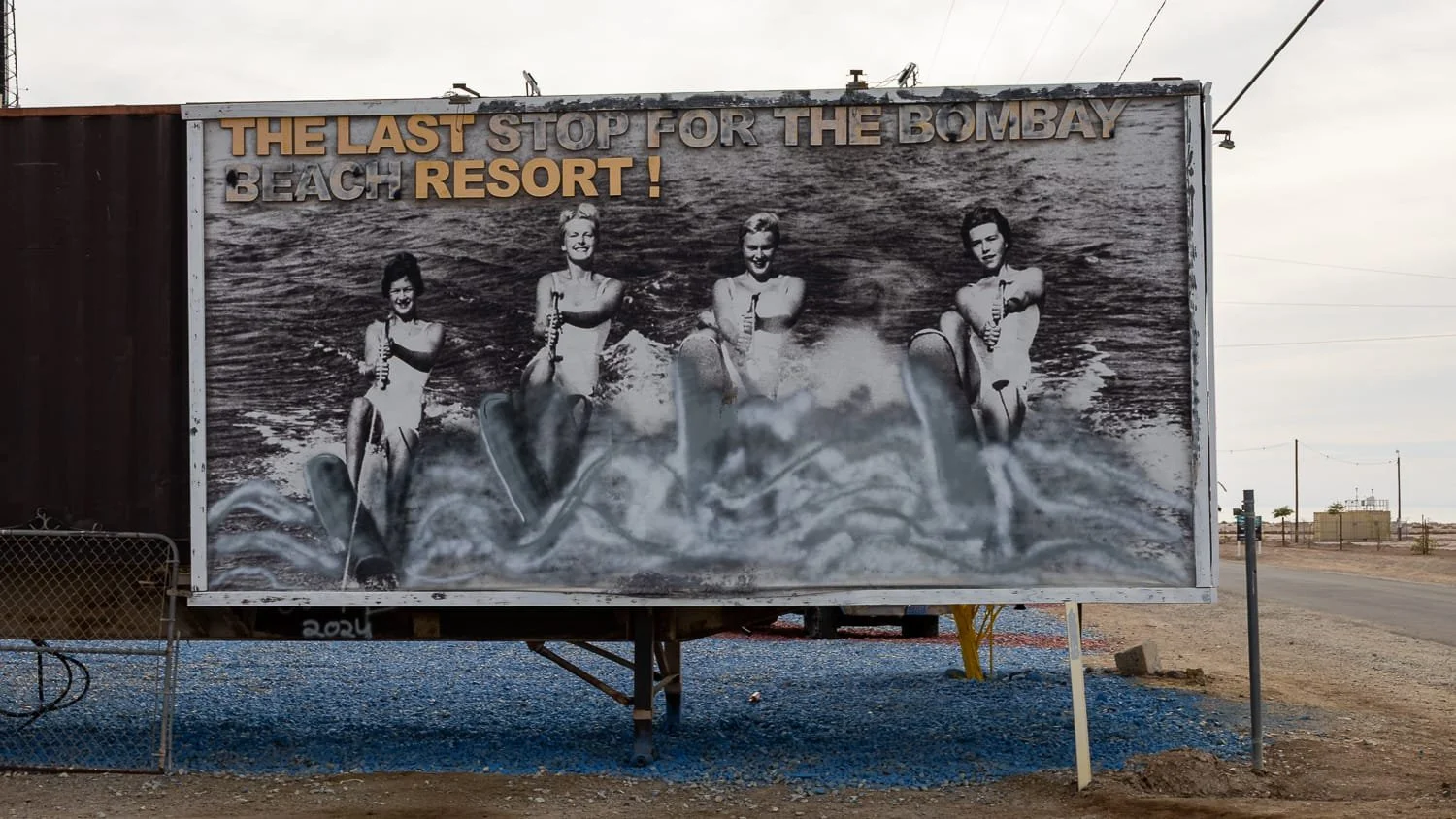 An old billboard for Bombay Beach, California.