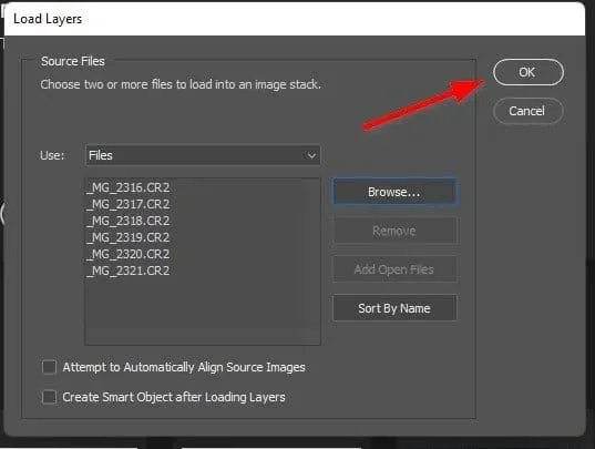 Finish loading the layers in Photoshop.