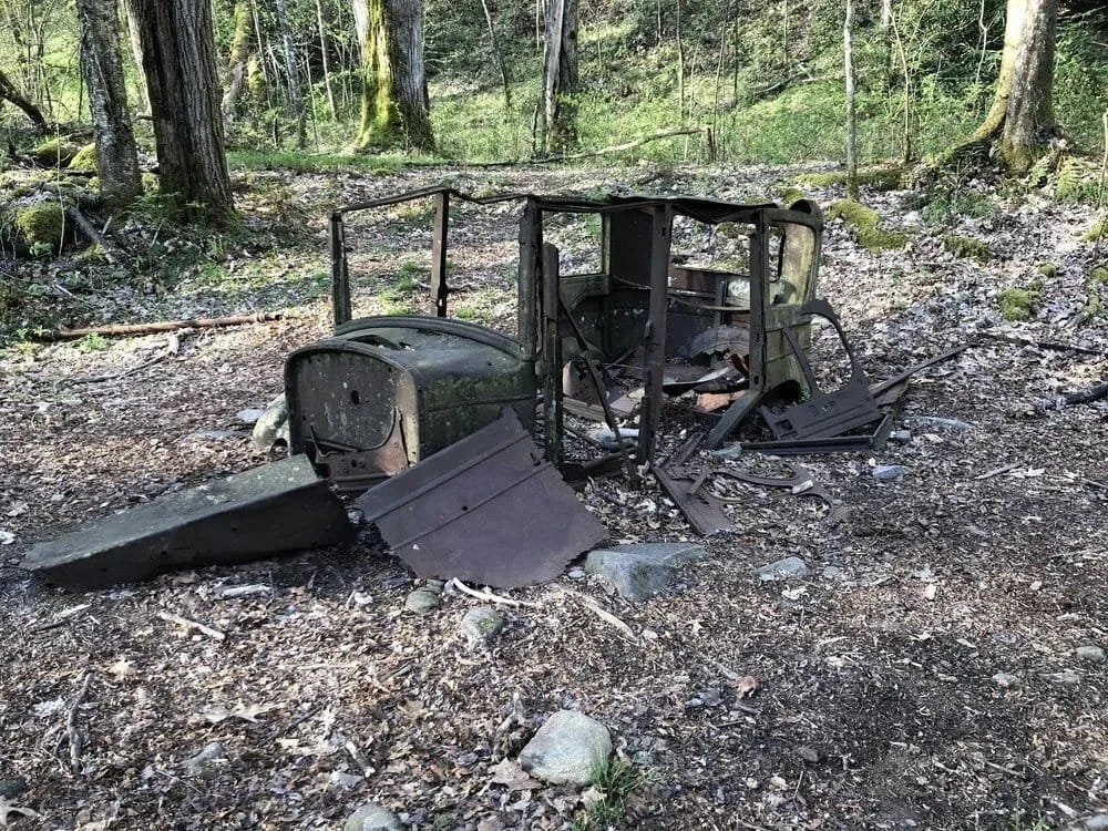 The remains of a 1920s or 30s-era Cadillac located just off the trail.
