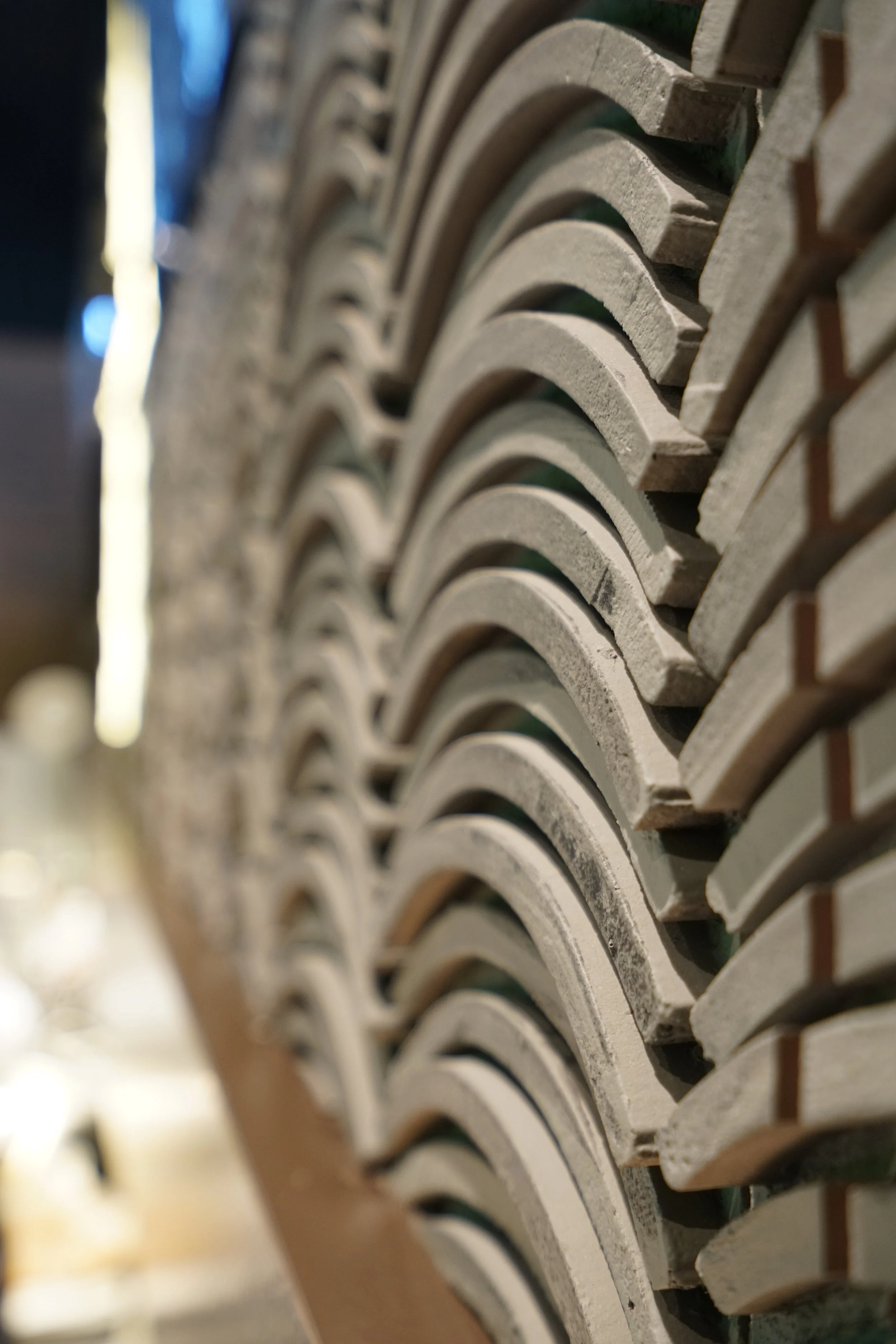 Close-up view of a tire pattern or tread on a vehicle or machinery.