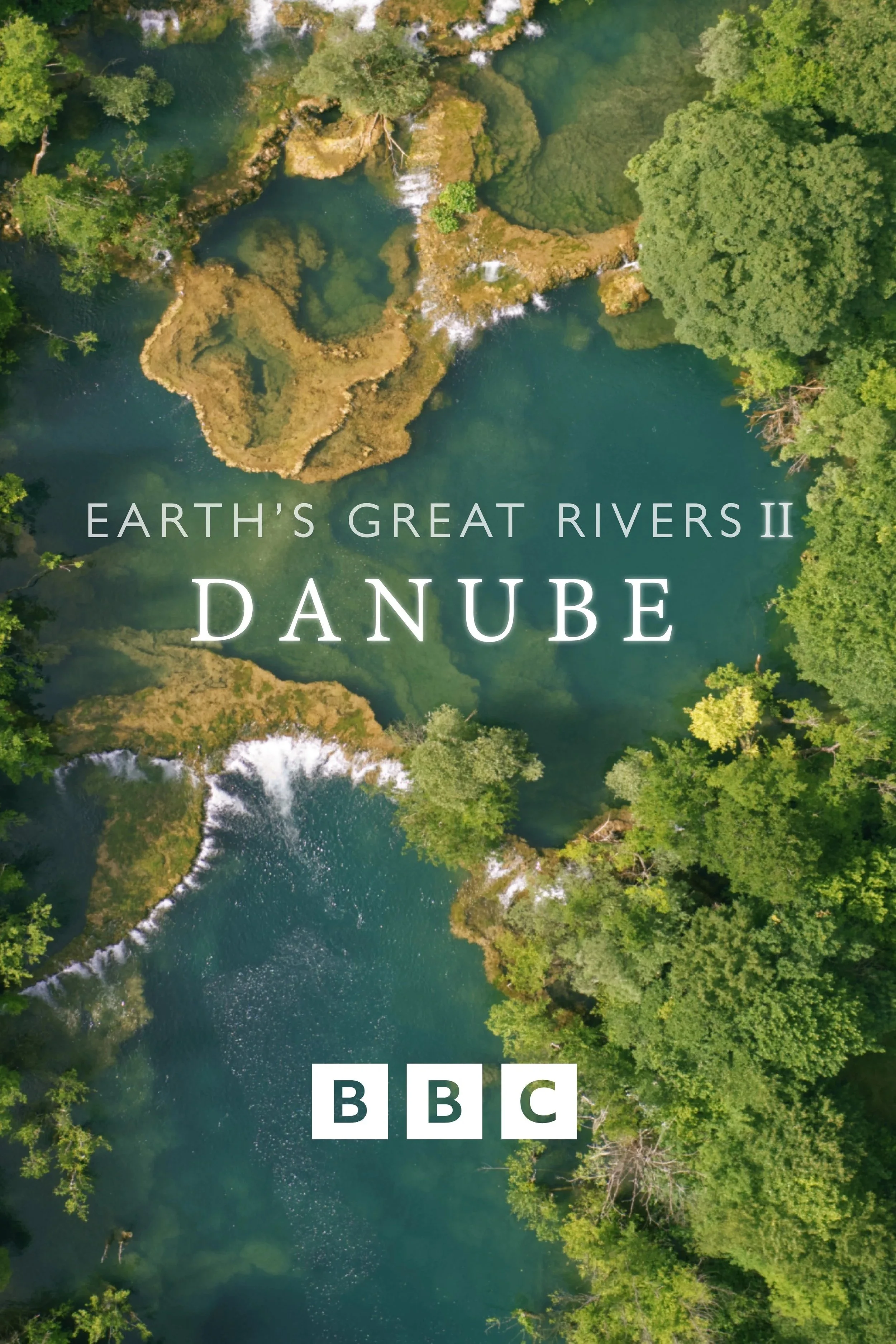 The poster of Earths Great Rivers season 2. Aerial view of a beautiful green and clear river with surrounding green trees and miniature waterfalls. Text on the image reads 'Earth's Great Rivers II Danube' and 'BBC' logos.
