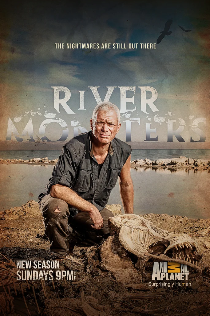 Jeremy Wade sitting on the ground next to a large skull, with a river and rocks in the background. The promotional poster is for Animal Planet's series 'River Monsters,' with text indicating a new season airing Sundays at 9 PM.