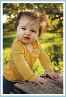 Young child communicating through facial expression during an everyday interaction.