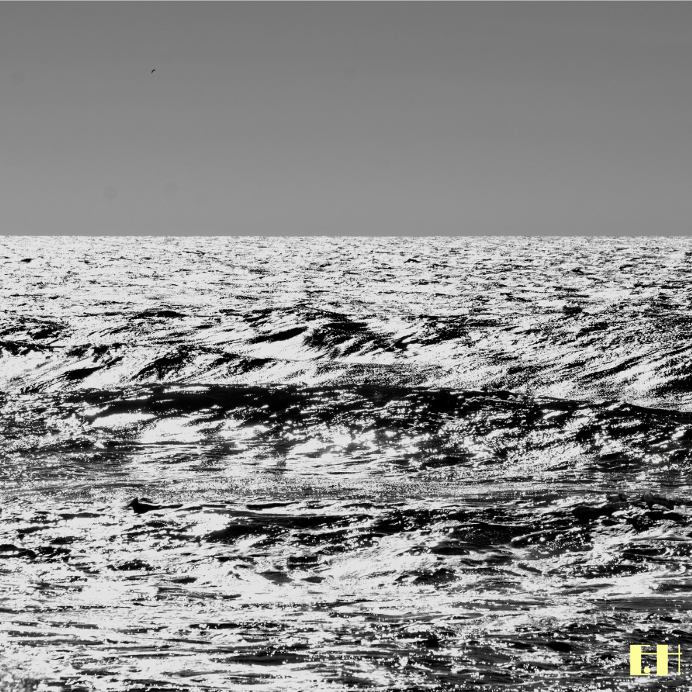 Lichtreflexe auf bewegtem Wasser aus der fotografischen Serie Fluctus.