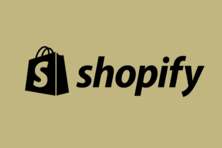 Shopify logo with shopping bag icon and text.