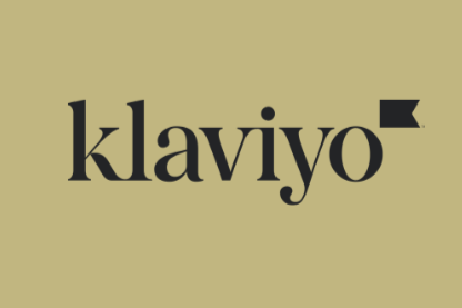 The word "klaviyo" in black letters on a light beige background, with a small black flag symbol above the letter 'o'.