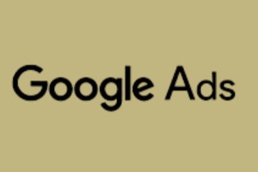 Google Ads logo on a beige background.
