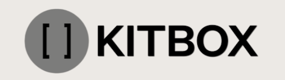 Logo with a gray circle containing brackets and the word 'KITBOX' in bold black text.