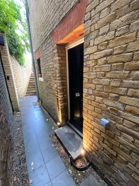 Hunza ELV garden lighting installation at dusk, Hampstead — Hobbs Electrical Group
