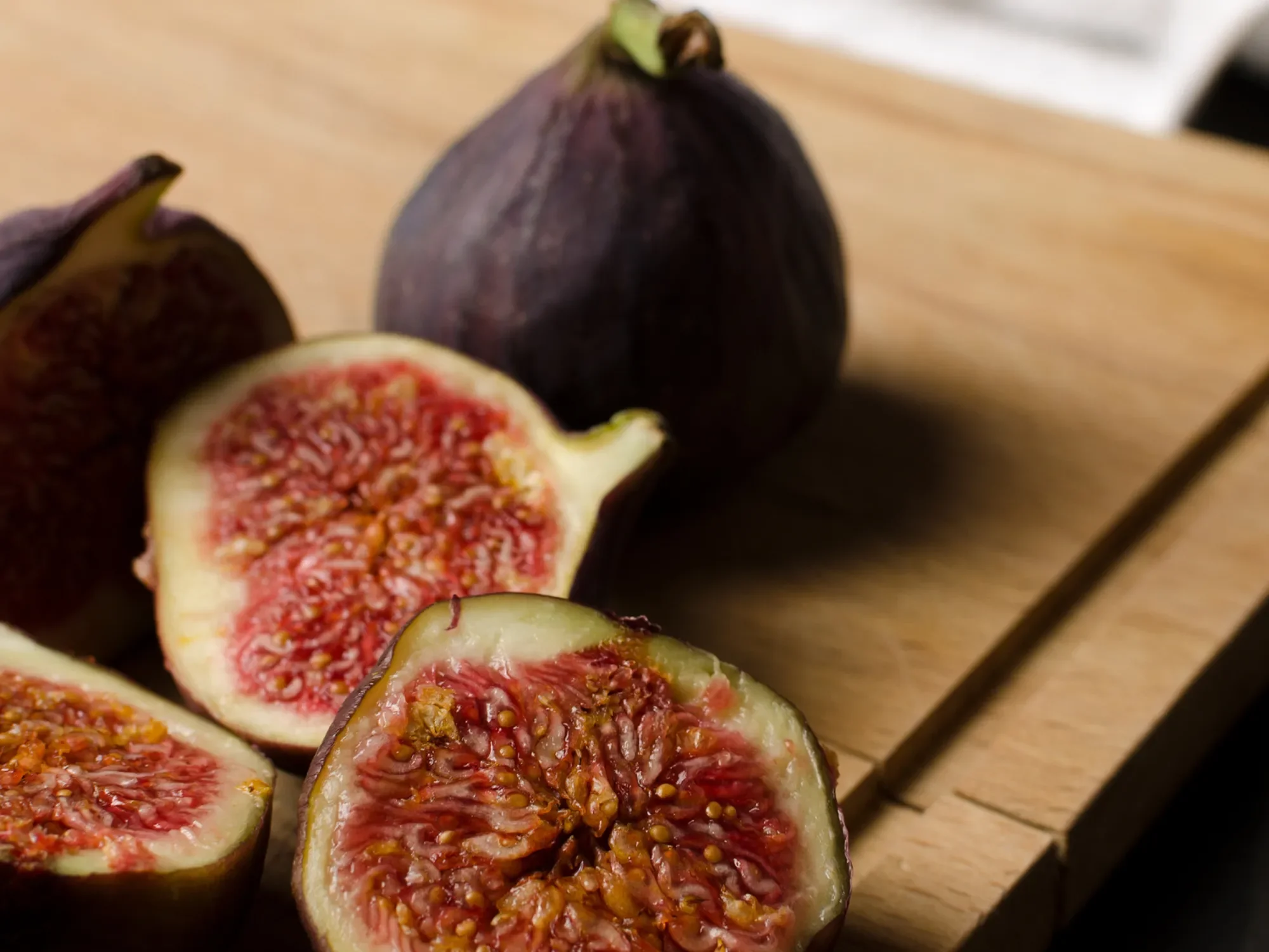 Figs displayed on a cutting board