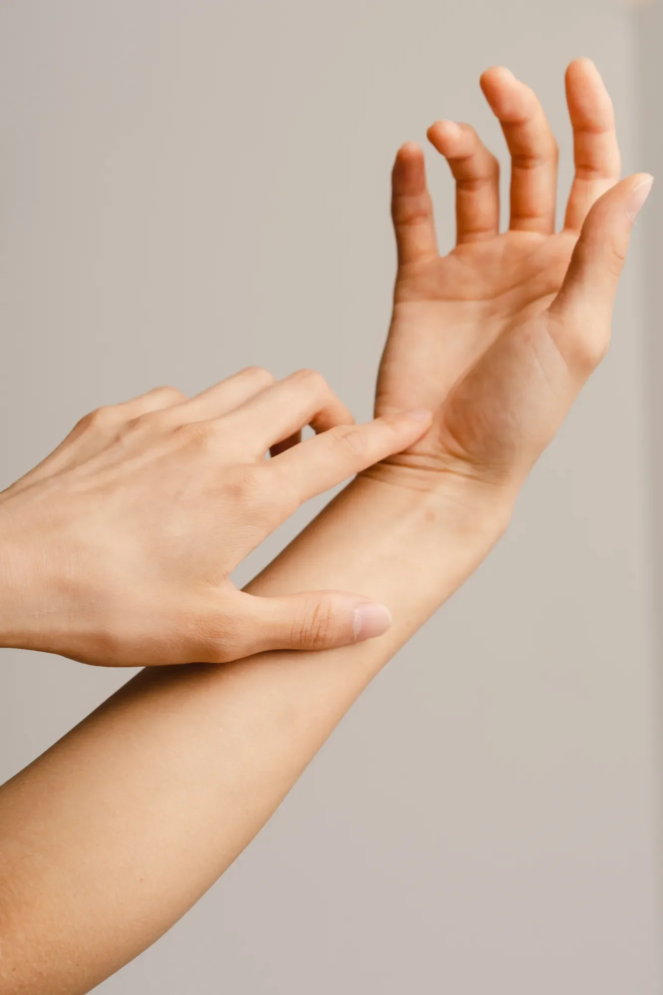 A pair of hands moving gracefully